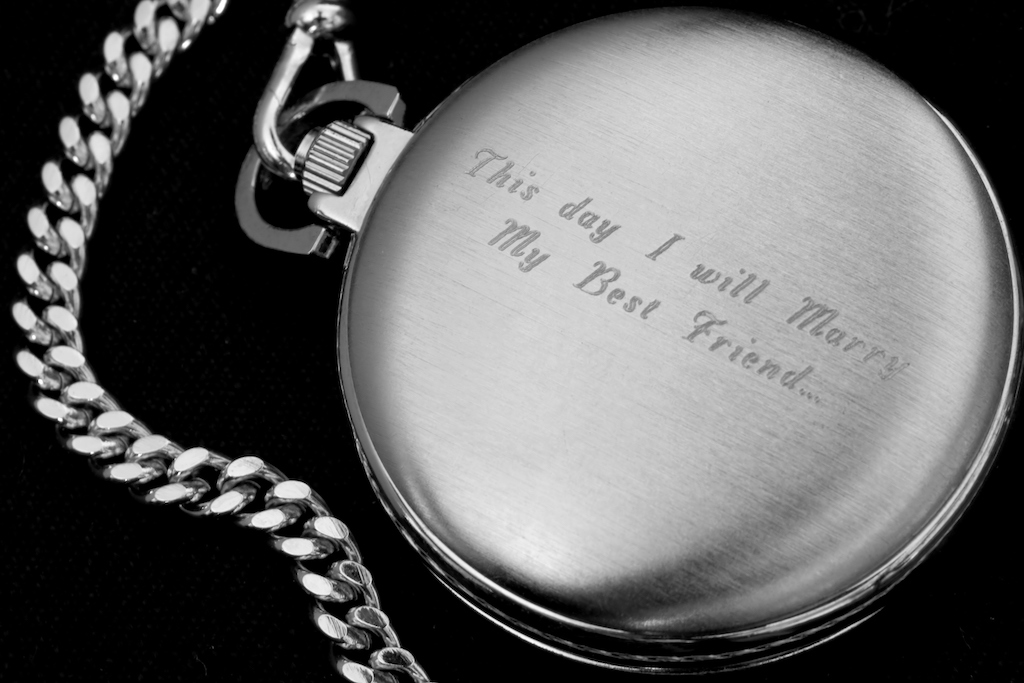 A pocket watch engraved for a wedding day. Watch engraving.