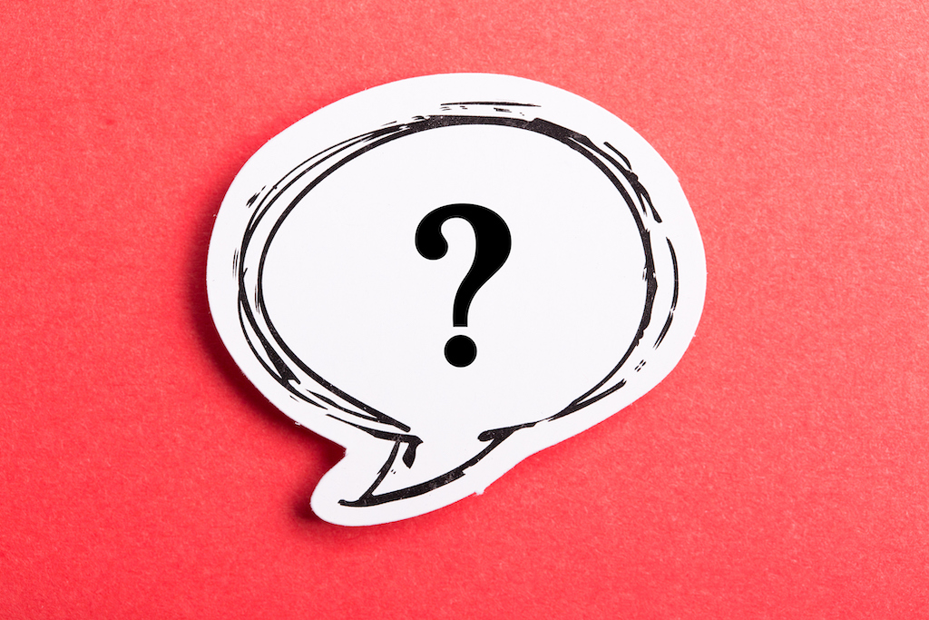 Red background with speech bubble and question mark. Representing FAQs about jewelry repair service.
