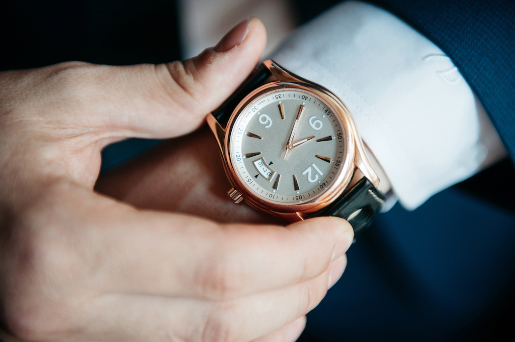 Fancy wristwatch on man with a suit. | Factory Authorized Watch Service Center