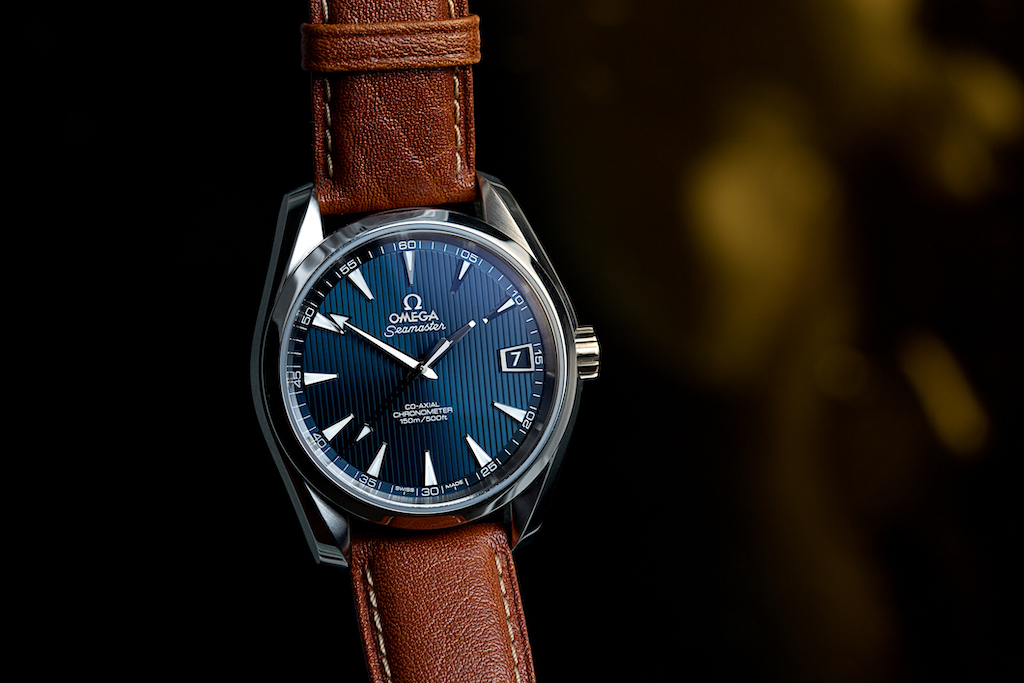 Blue Omega watch with brown straps. Omega Watch Repair